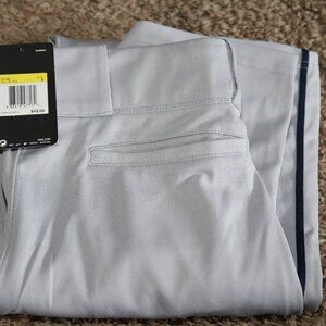 Nike Adult baseball pants with piping. Size Small, grey with piping.